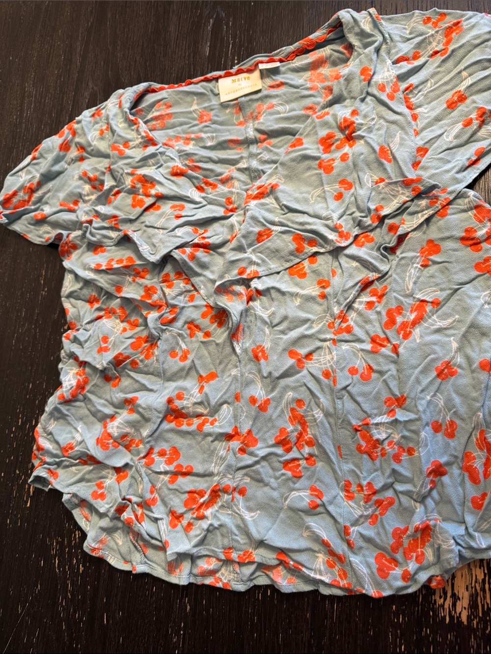 Anthropologie Sky Blue Short Sleeve Blouse with Orange Cherry Motif